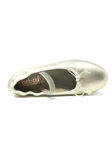 bailarina dorada con goma