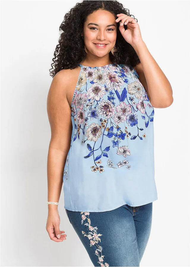 Blusa sin mangas azul pálido con flores