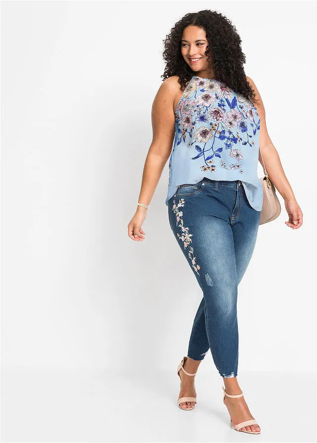 Blusa sin mangas azul pálido con flores
