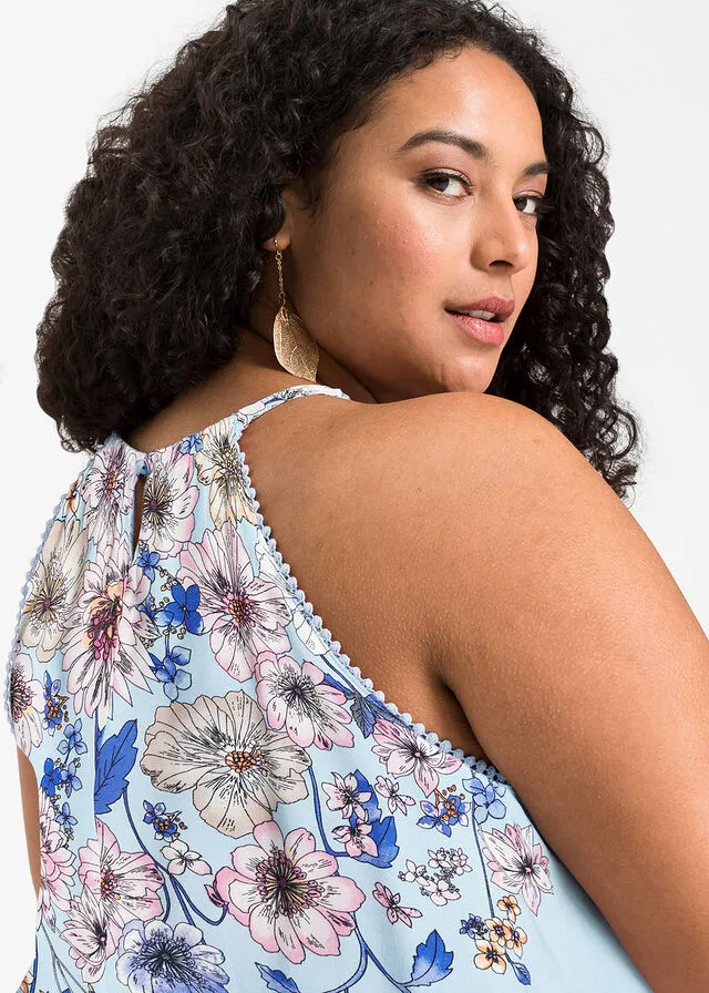 Blusa sin mangas azul pálido con flores