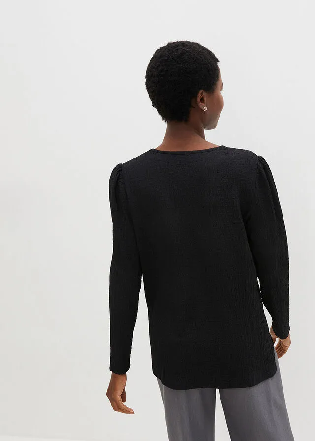 Camiseta de punto texturizado con mangas largas ligeramente abullonadas Negro
