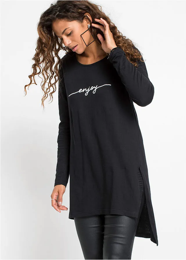CAMISETA LARGA CON ABERTURAS Y ESTAMPADO NEGROBLANCO