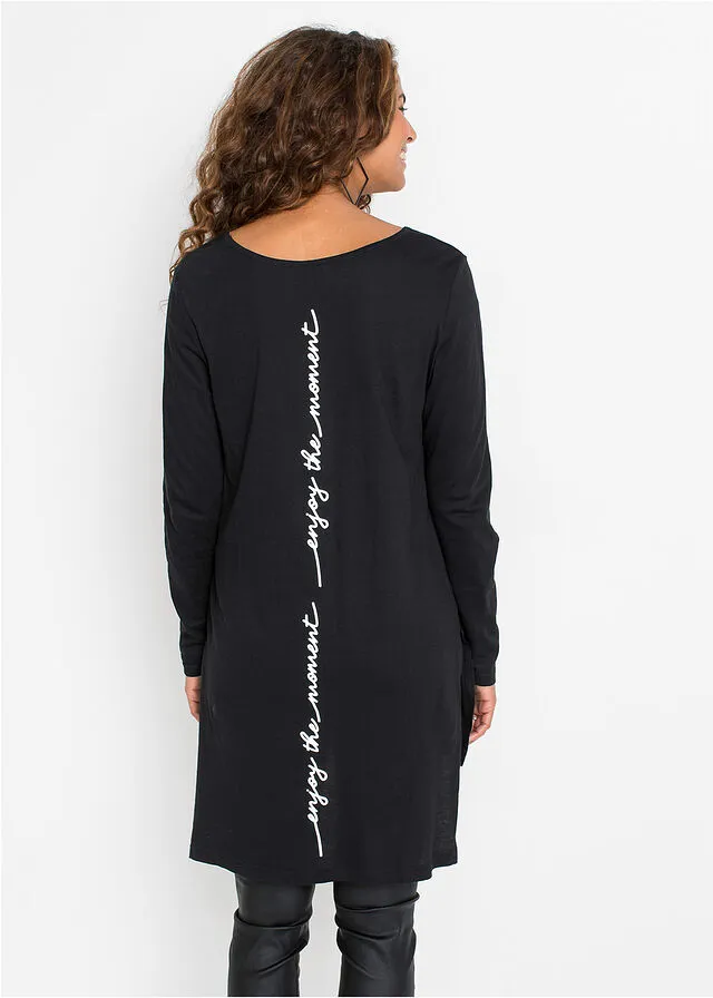 CAMISETA LARGA CON ABERTURAS Y ESTAMPADO NEGROBLANCO