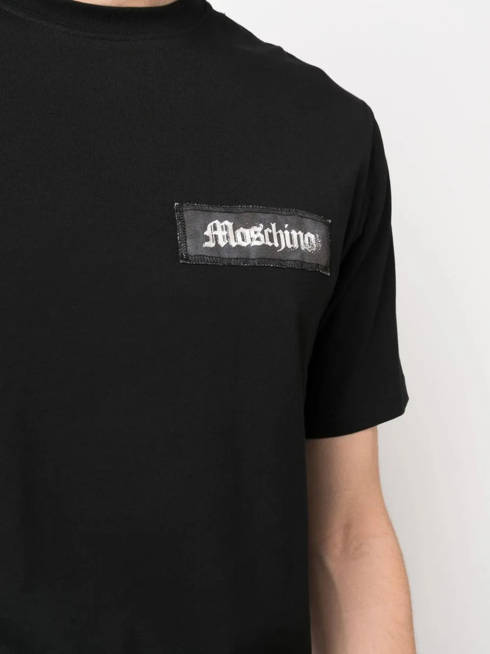 CAMISETA PARCHE NEGRA
