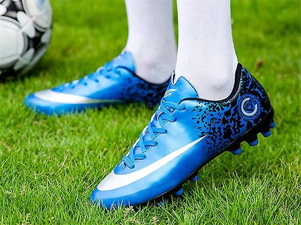 Marca de moda Zapatos de fútbol para hombres y mujeres Antideslizantes Ag Spiked Sneakers Lightweight Roundabout Scrub Toe Cap F