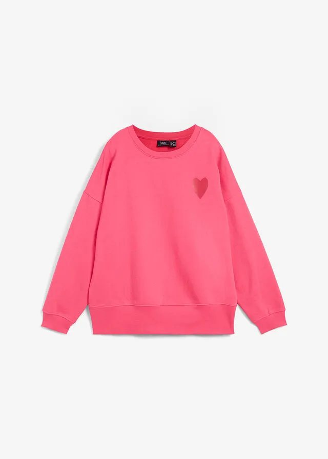 SUDADERA DE ALGODóN ORGáNICO CON CORTE CóMODO Y ABERTURAS LATERALES ROSA OSCUROROJO CAYENA ESTAMPADO