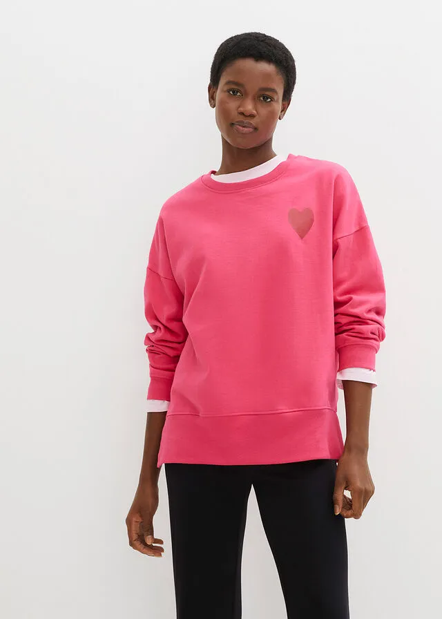 SUDADERA DE ALGODóN ORGáNICO CON CORTE CóMODO Y ABERTURAS LATERALES ROSA OSCUROROJO CAYENA ESTAMPADO