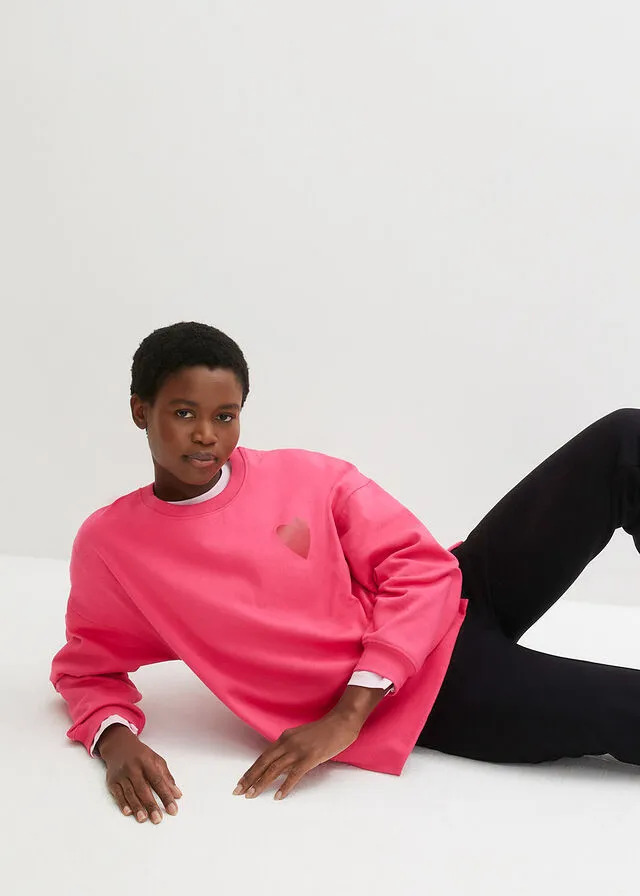SUDADERA DE ALGODóN ORGáNICO CON CORTE CóMODO Y ABERTURAS LATERALES ROSA OSCUROROJO CAYENA ESTAMPADO