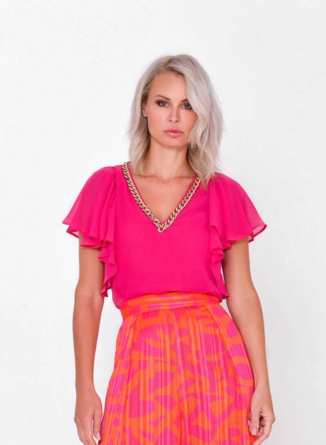 Top liso con volante en mangas