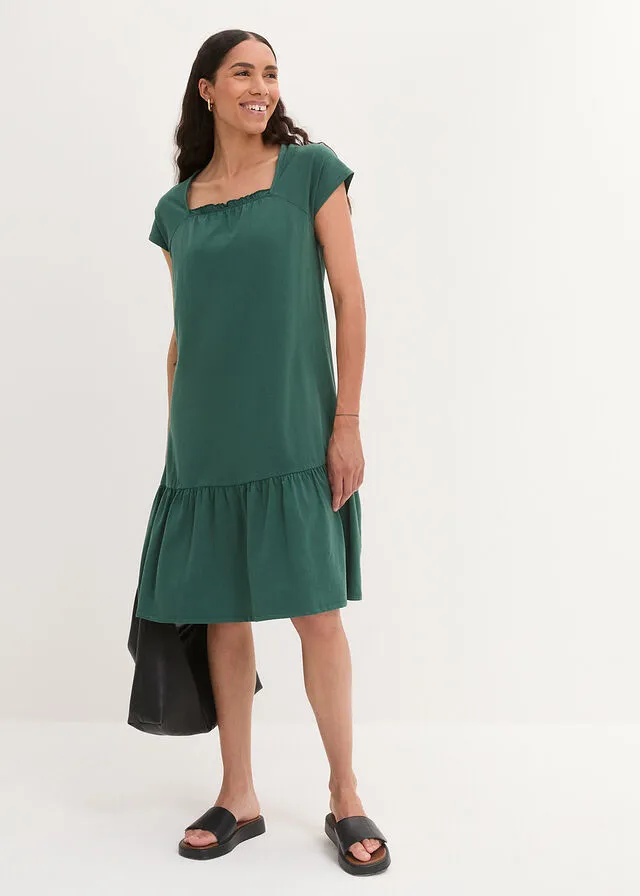 Vestido de punto de algodón con aberturas, mangas de murciélago y largo hasta la rodilla verde mate