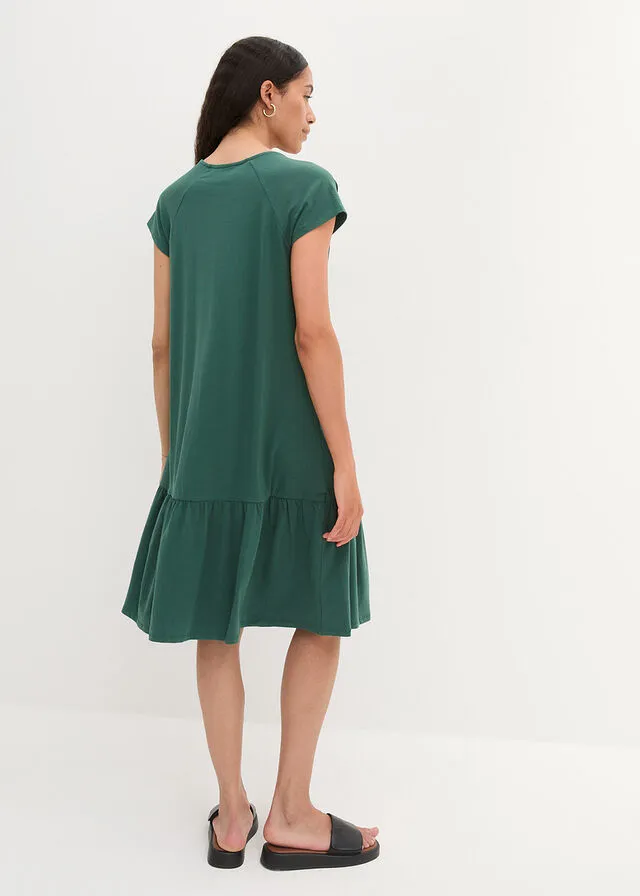 Vestido de punto de algodón con aberturas, mangas de murciélago y largo hasta la rodilla verde mate