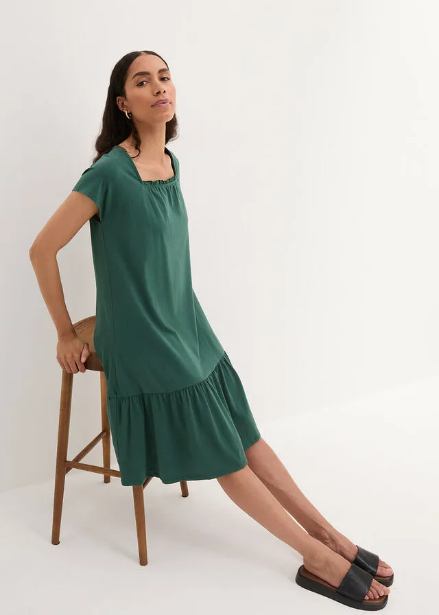 Vestido de punto de algodón con aberturas, mangas de murciélago y largo hasta la rodilla verde mate