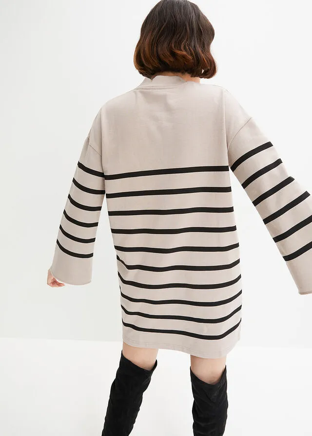 VESTIDO TIPO SUDADERA CON MANGAS ACAMPANADAS PIEDRA JASPEADONEGRO