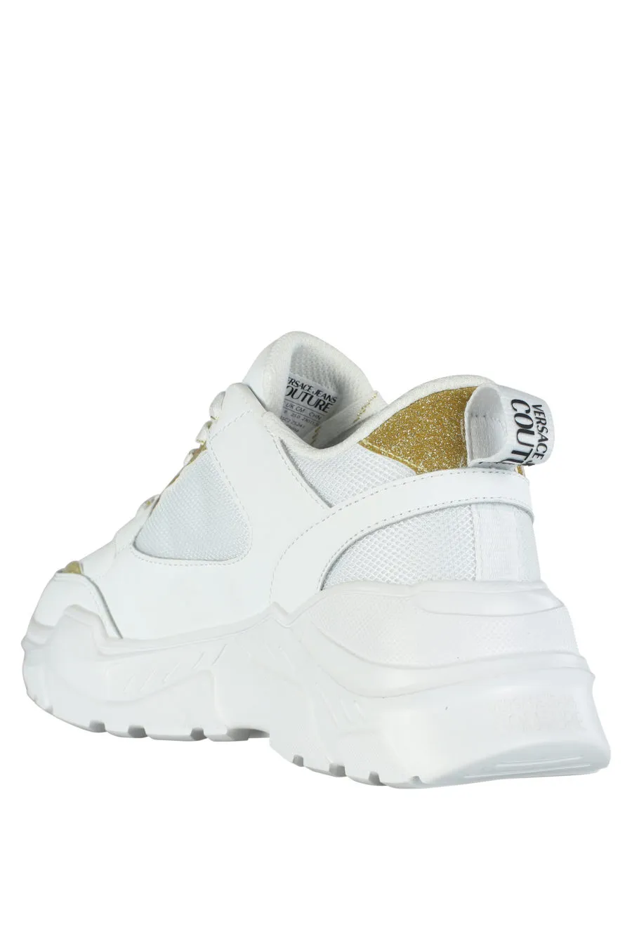 Zapatillas blancas con detalles dorado 
